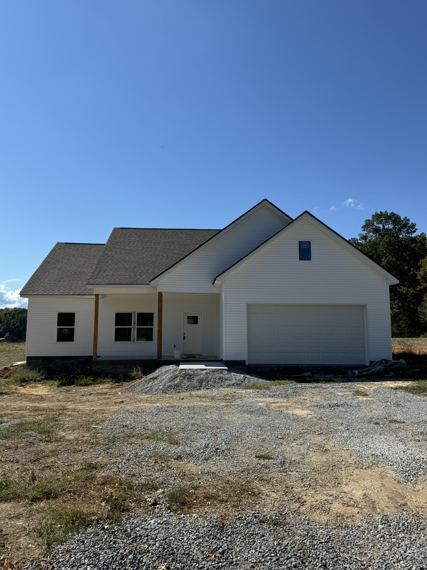 a house with trees in the background