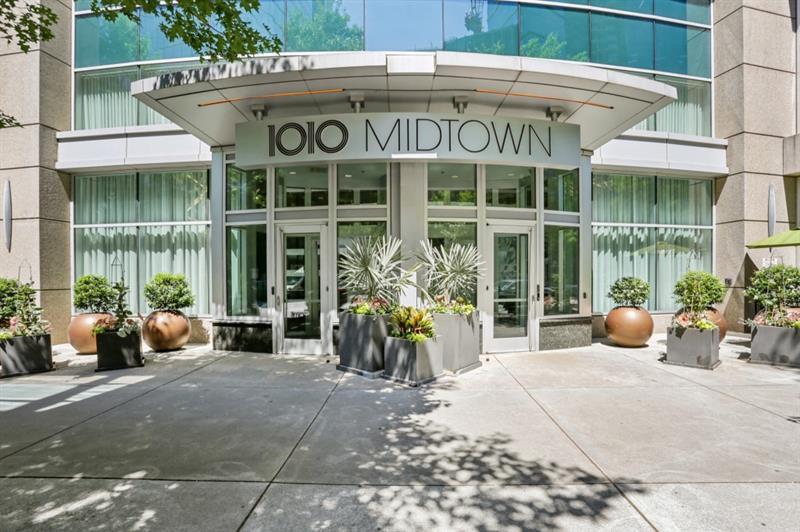 a view of a building with sitting area