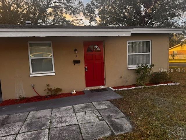 a front view of a house with yard