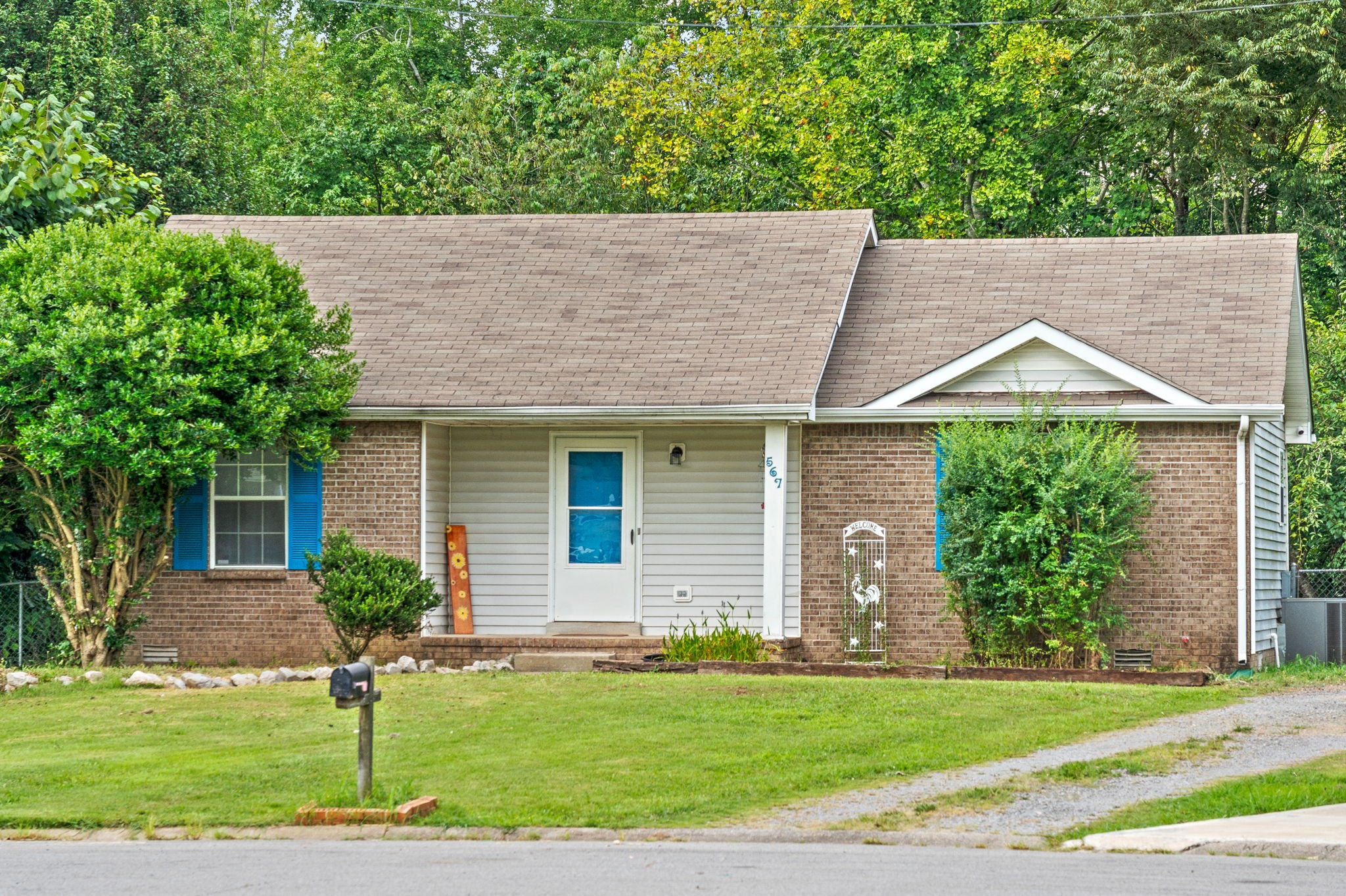 a house view with a garden space