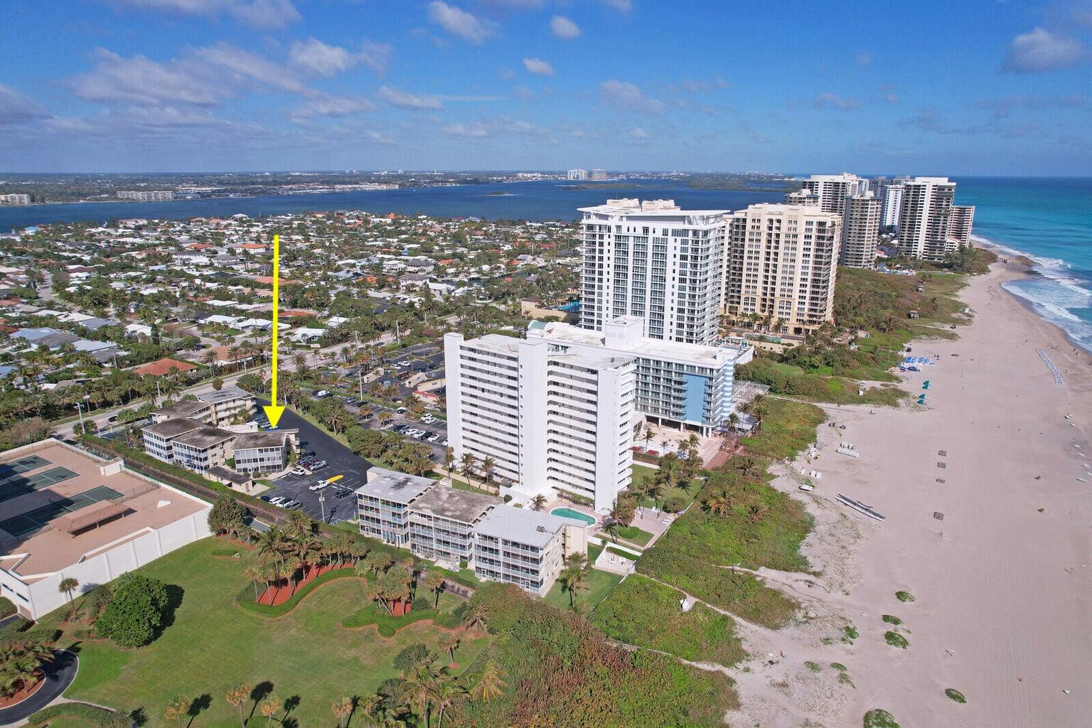 a view of city with ocean