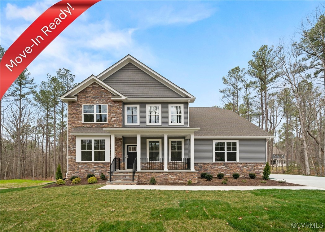 Craftsman-style home featuring a porch and a front