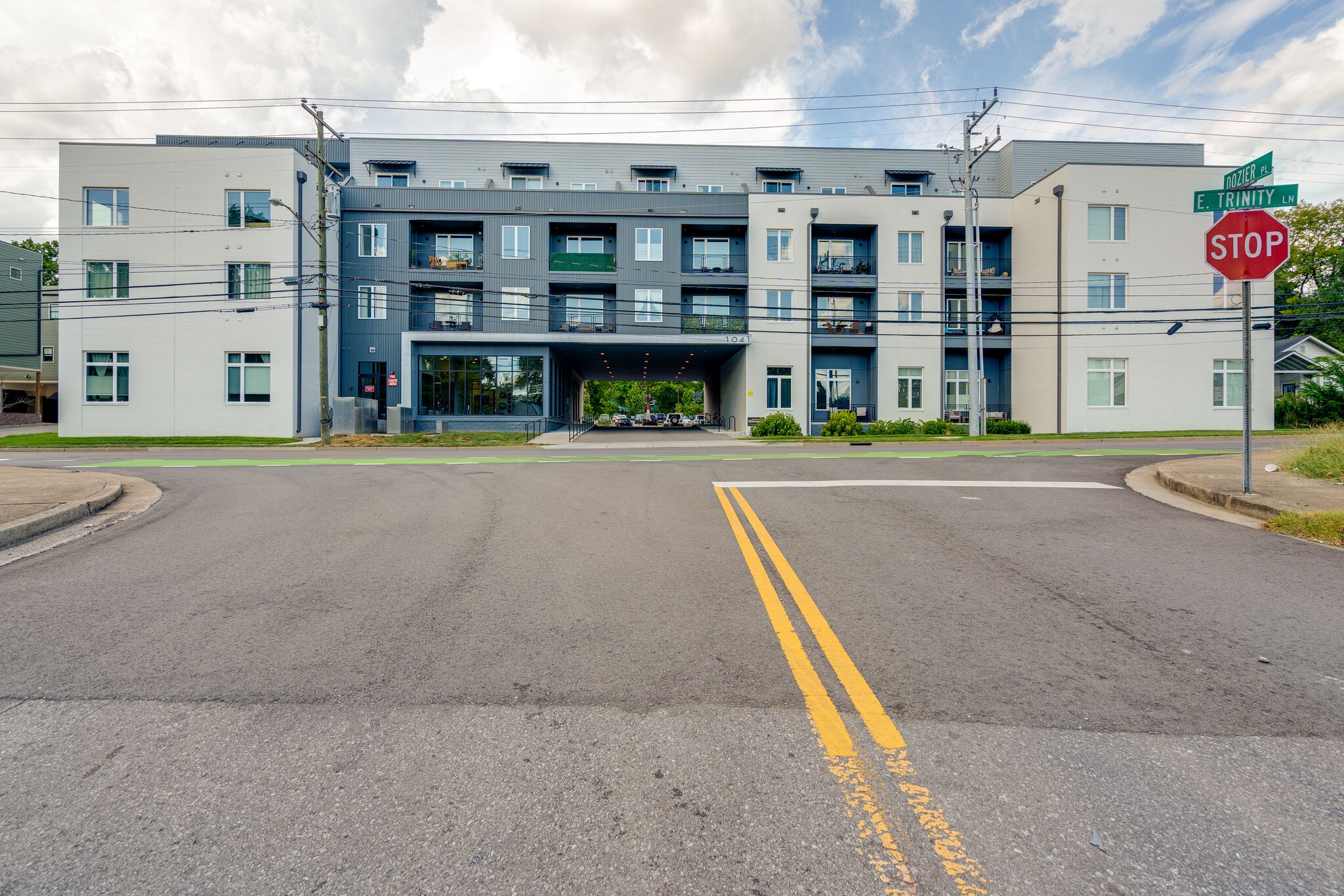 a front view of building with traffic signal lights