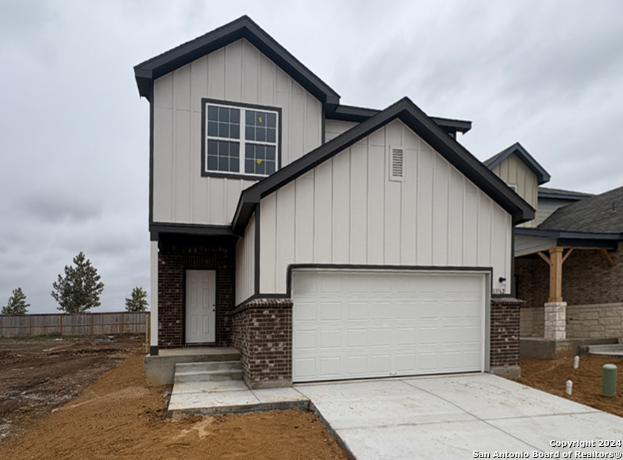 a view of a house with garage