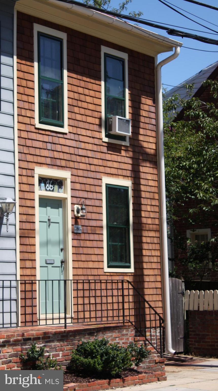 a view of a brick house with a window