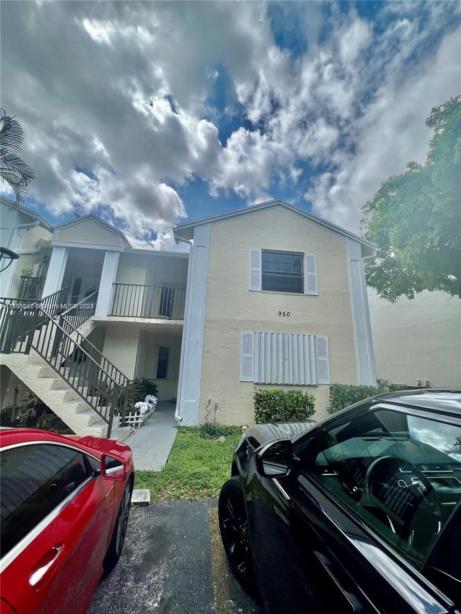 a car parked in front of a house