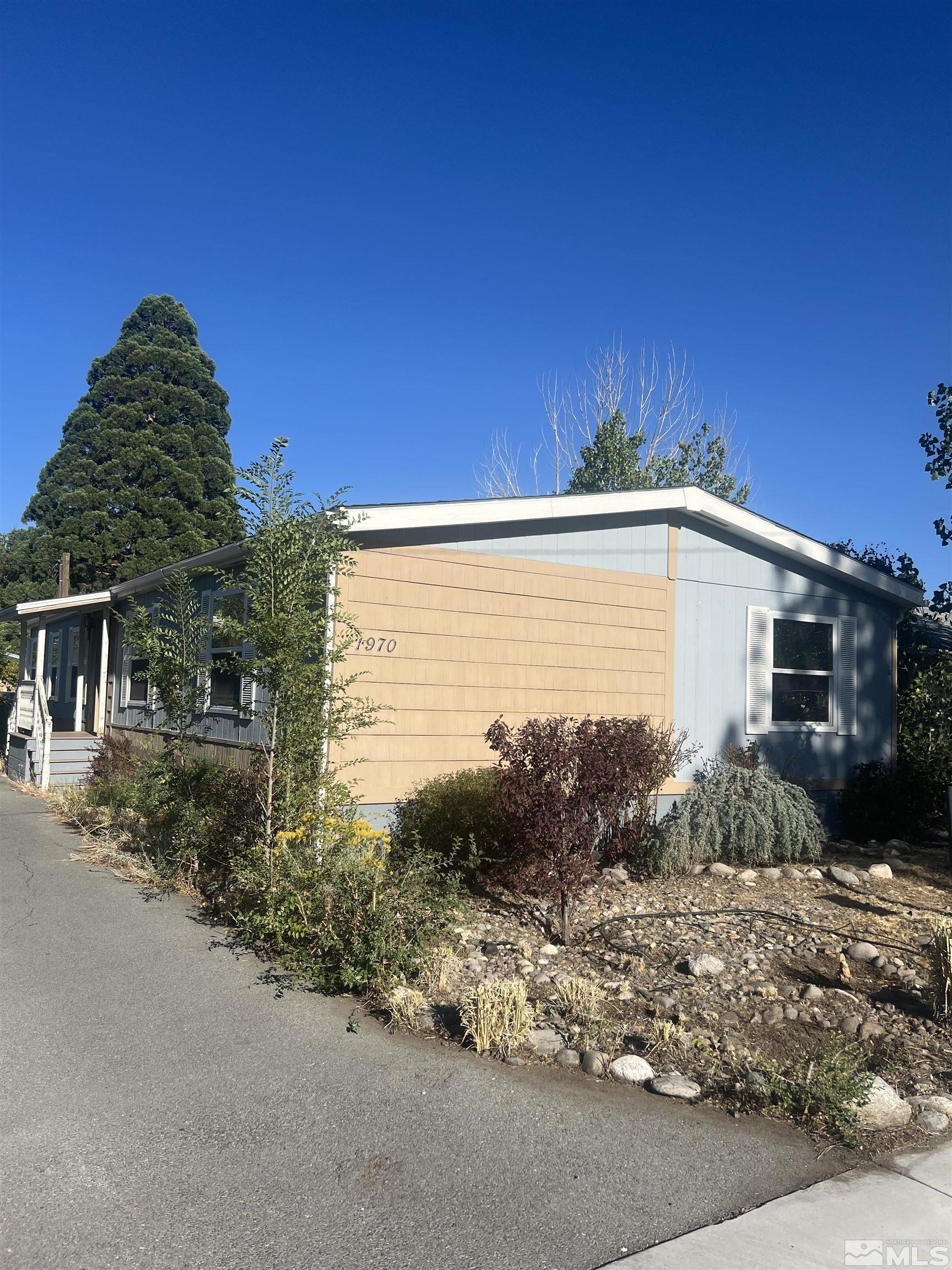 a view of a back yard of the house