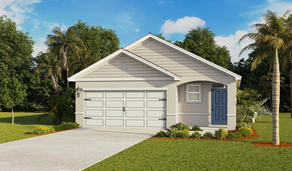 a front view of a house with a yard and garage