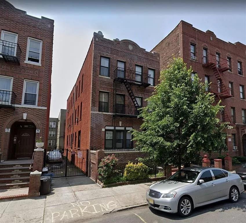 a car parked in front of a building