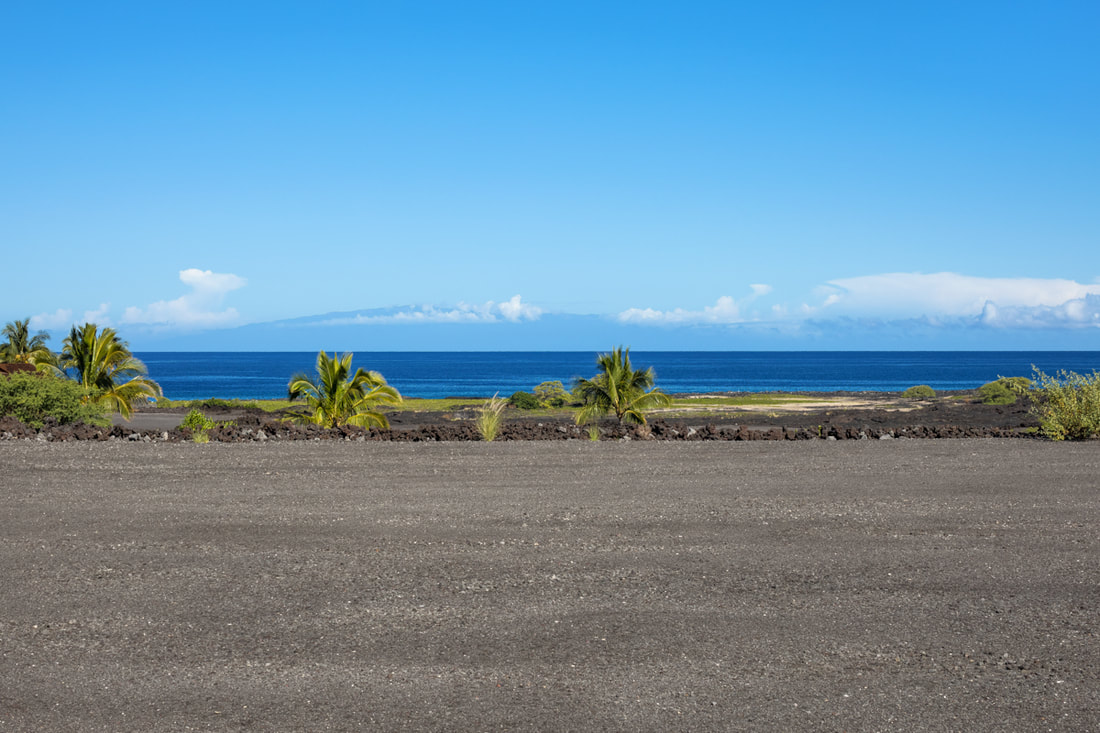 a view of a beach with a yard