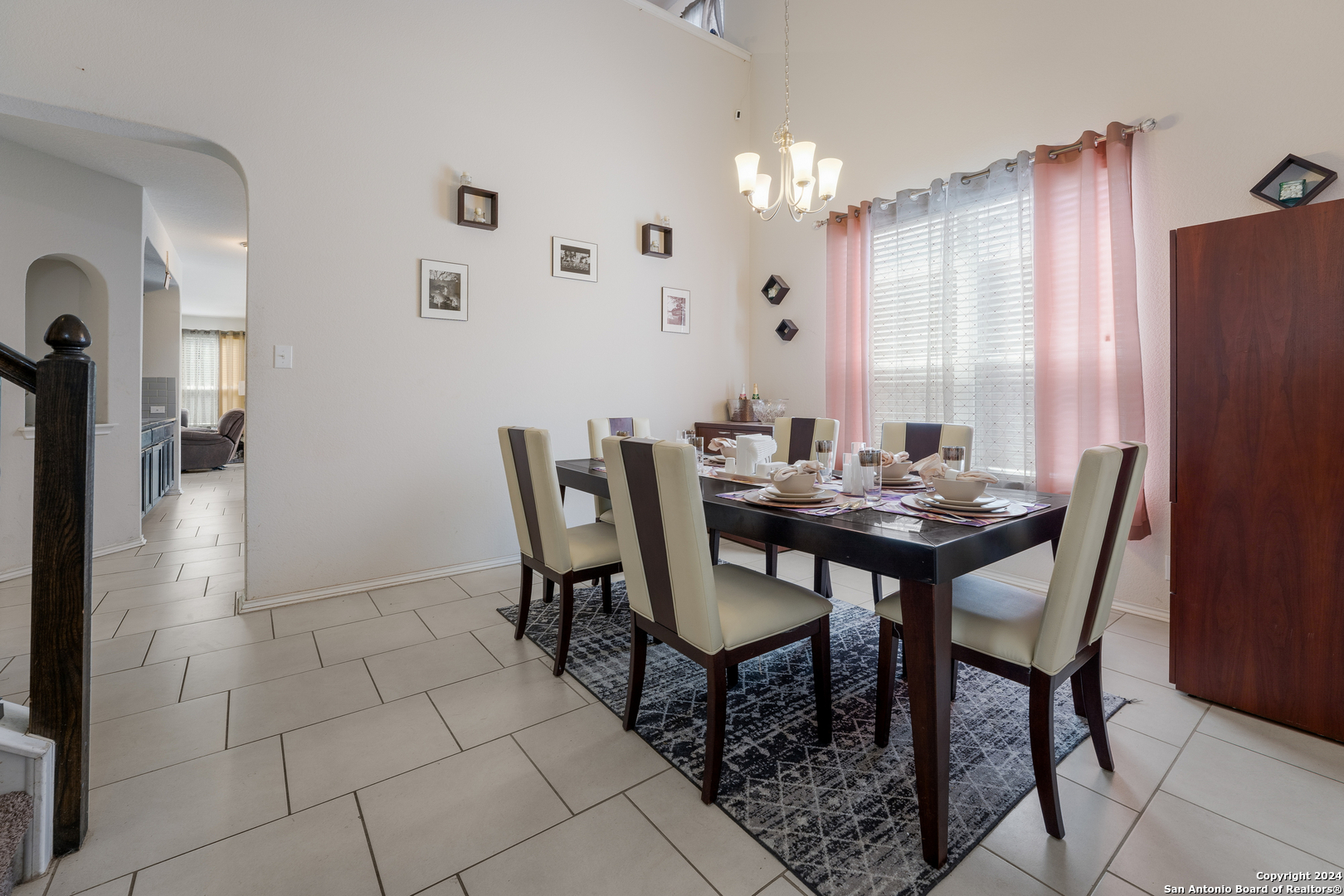 a view of a dining room with furniture