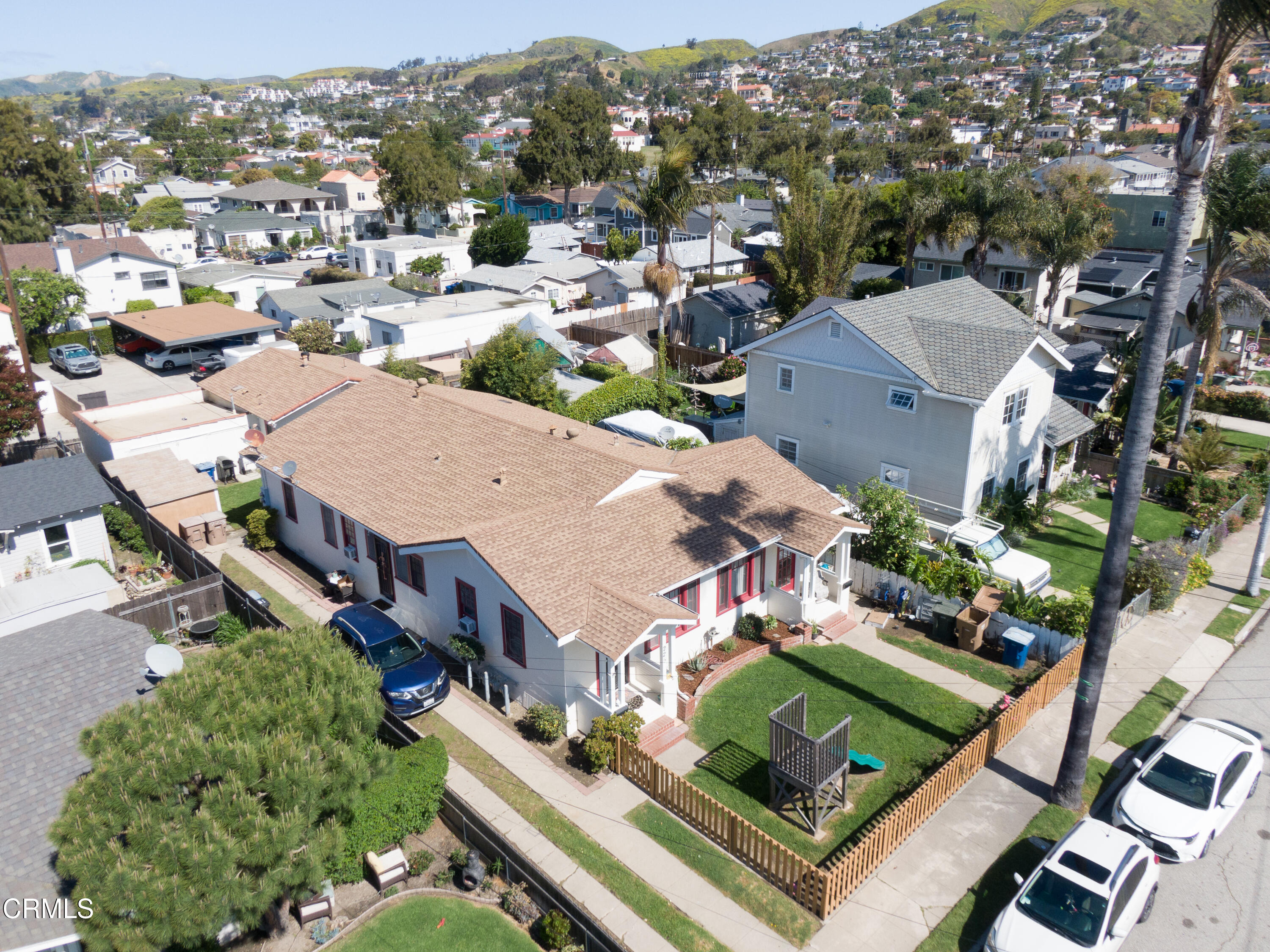 an aerial view of a house with a garden