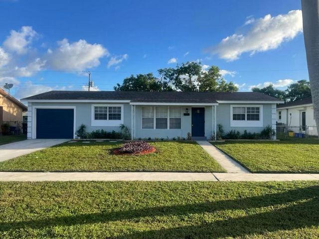 $449,000 | 218 Baker Drive | Palm Beach Lakes South