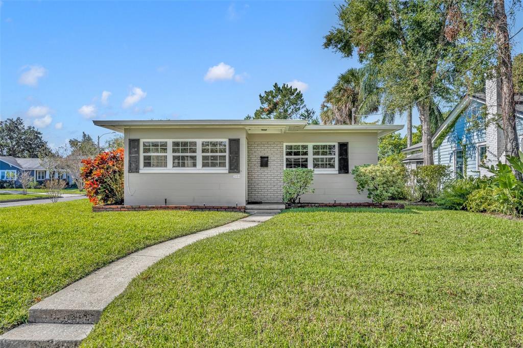 front view of a house with a yard