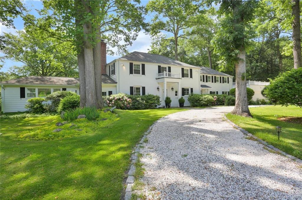 Front view of home. Circular driveway.