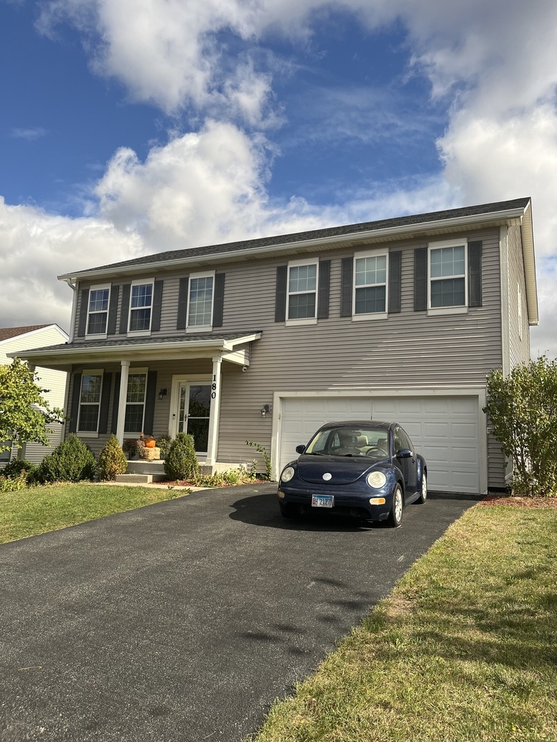 a car parked in front of a house