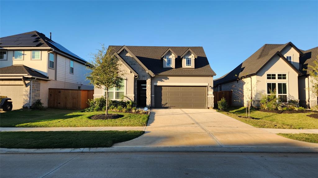 a view of a house with entertaining space and garden