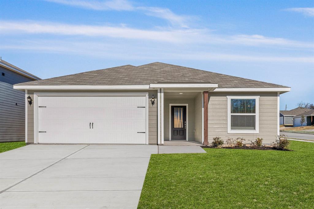 front view of house with a yard