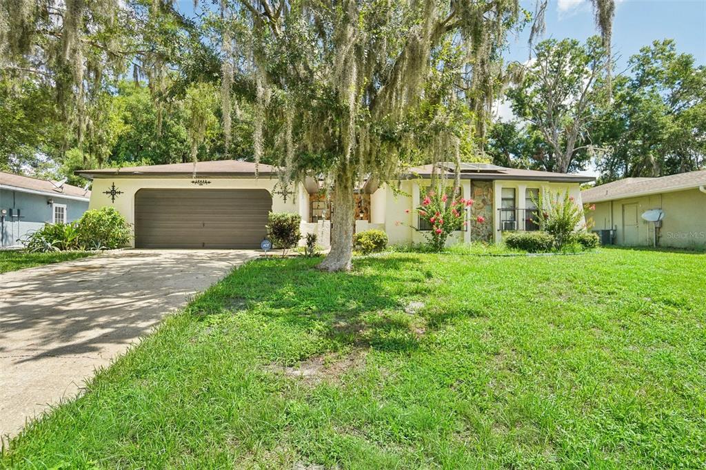 front view of a house with yard