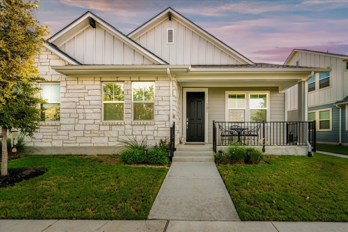 This Galvez floor plan over looks a community greenspace.  Sunset views are wonderful from this large covered front porch.