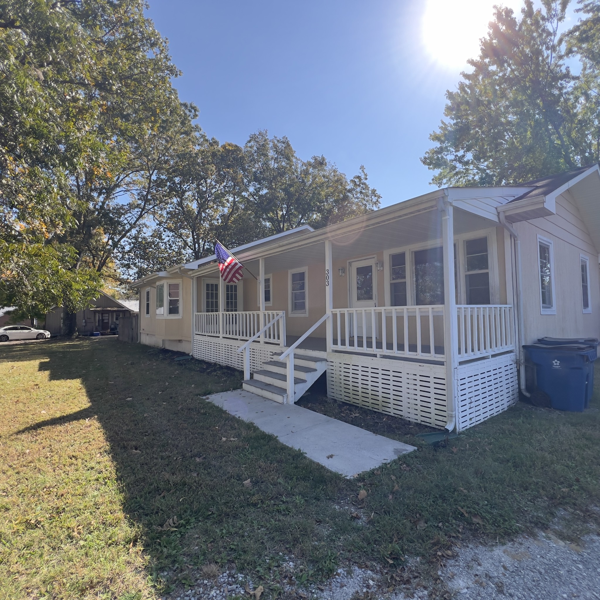 front view of a house with a yard