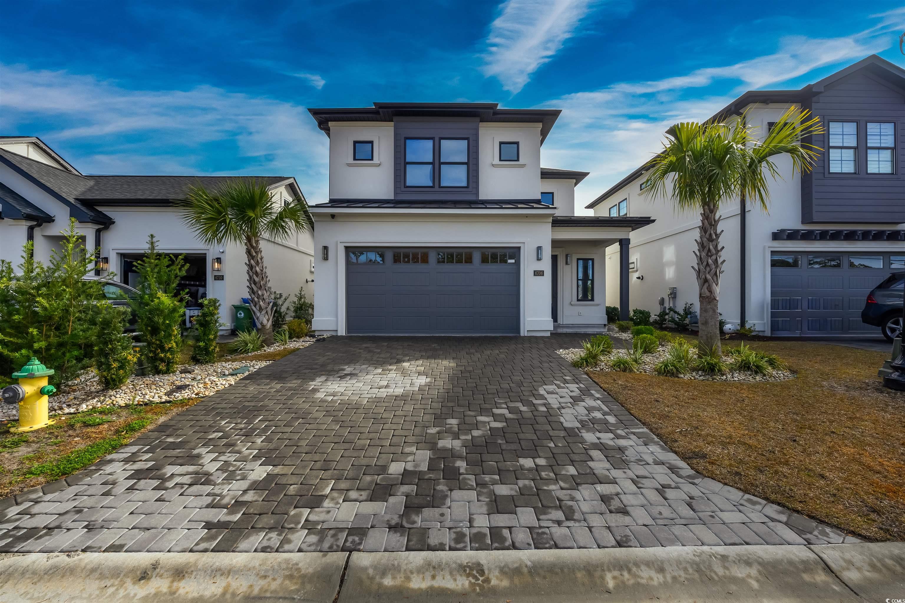 View of front of house featuring a garage