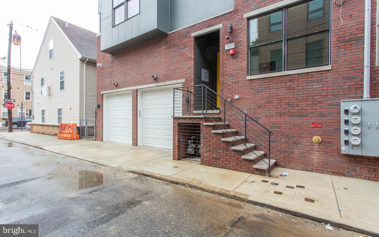 a view of a house with a street