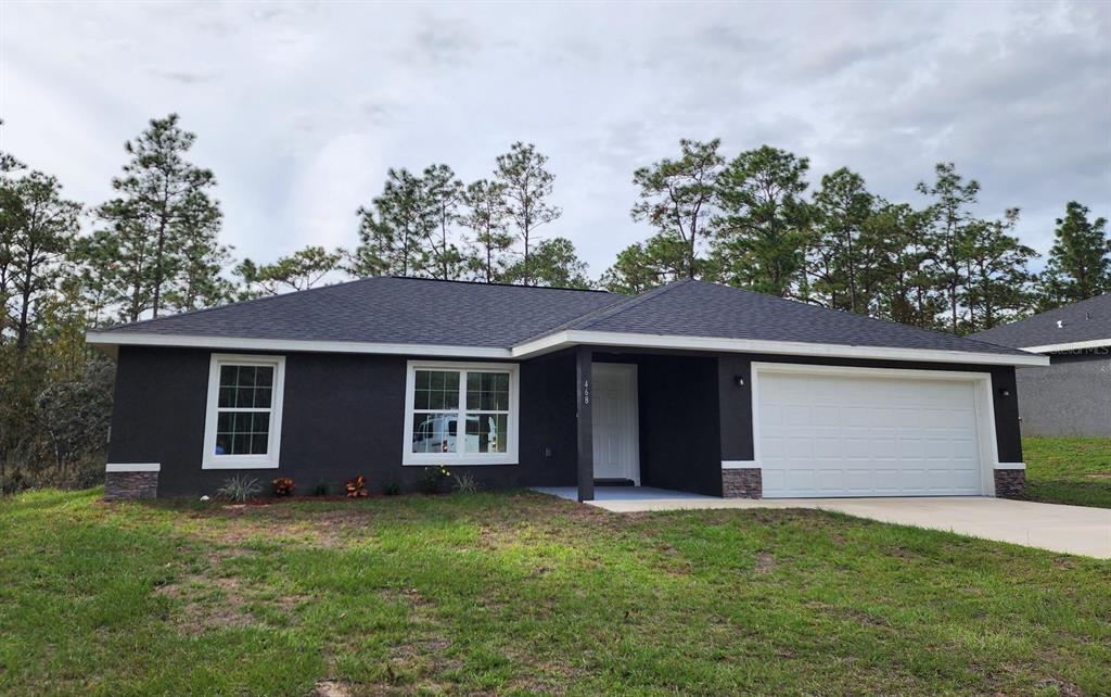 front view of house with a yard