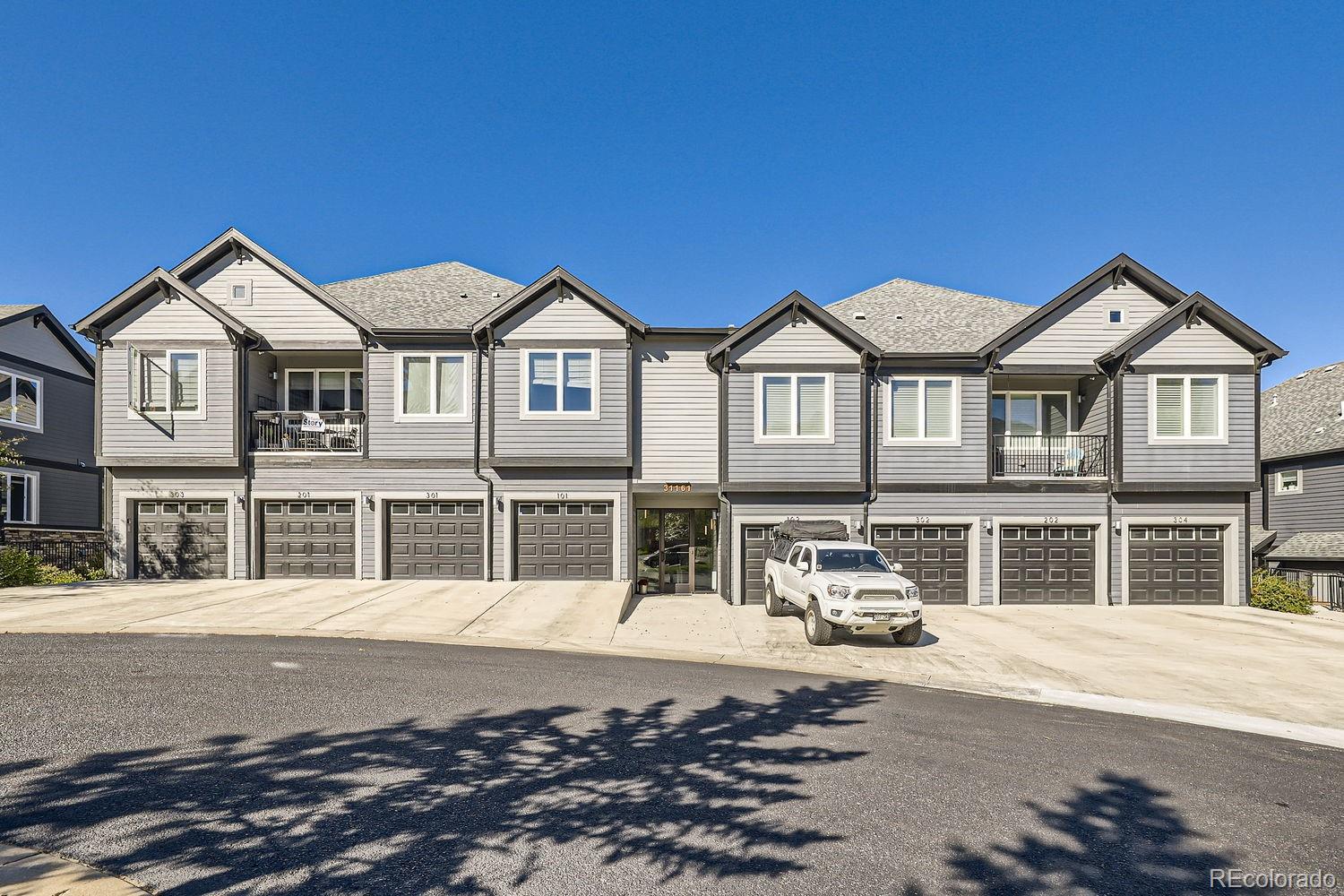 a front view of a house with a ocean view