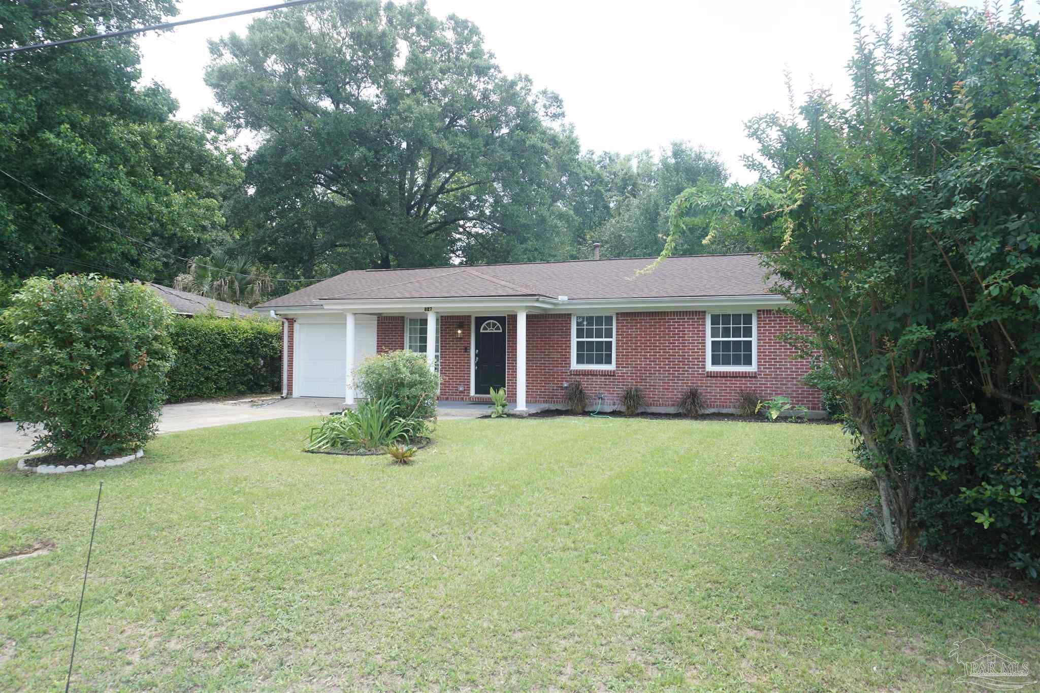 front view of a house and a yard