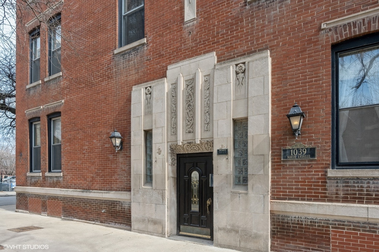 a view of a entryway with brick walls