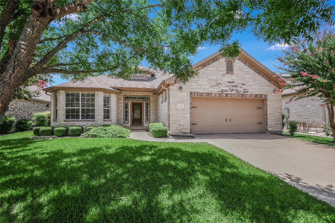 front view of a house and a yard