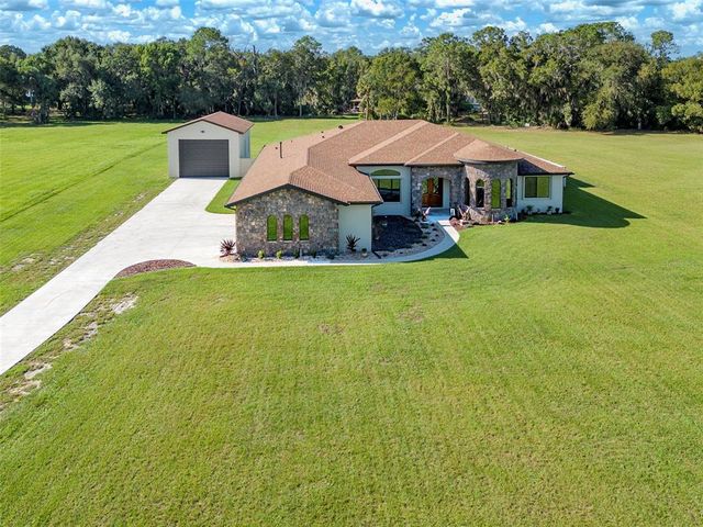 Homes for Sale with a Garage in Venetian Village, Tavares, FL | Compass