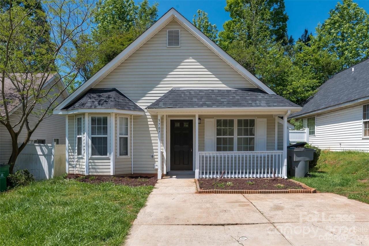 a front view of a house with a porch