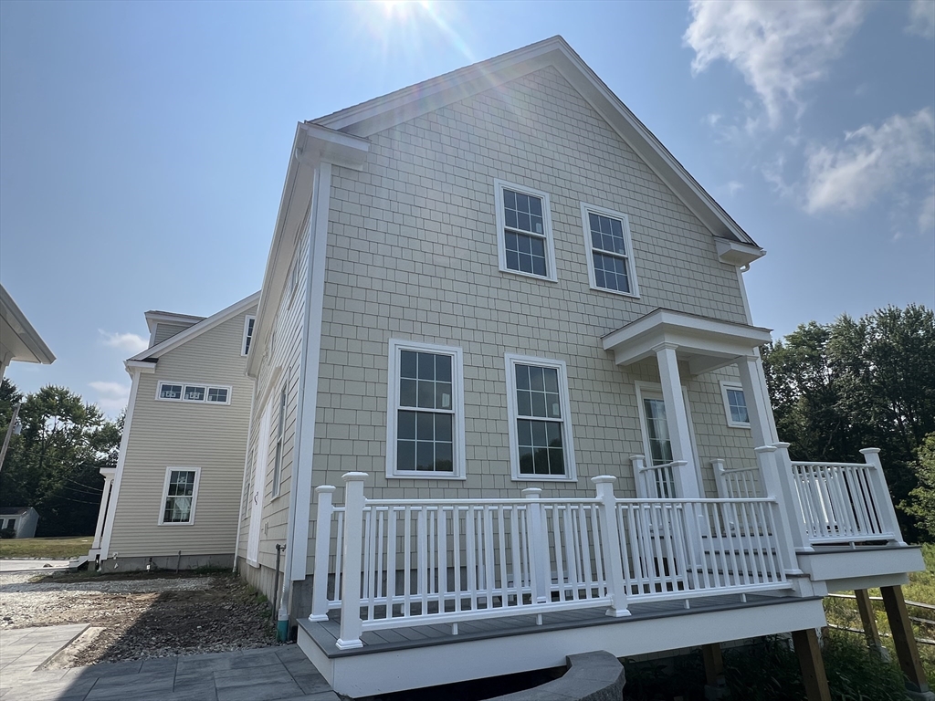 a view of a house with a deck