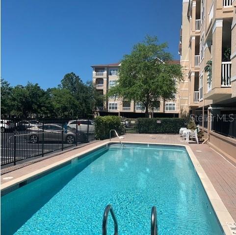 a view of outdoor space yard swimming pool and seating