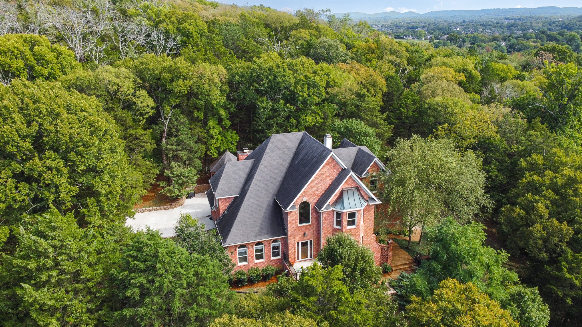 Welcome to 9413 Atherton Court.  It is rare to find a home that offers this much privacy - located in the heart of a popular Brentwood neighborhood and just 25 minutes from downtown Nashville ...Truly the best of both worlds!