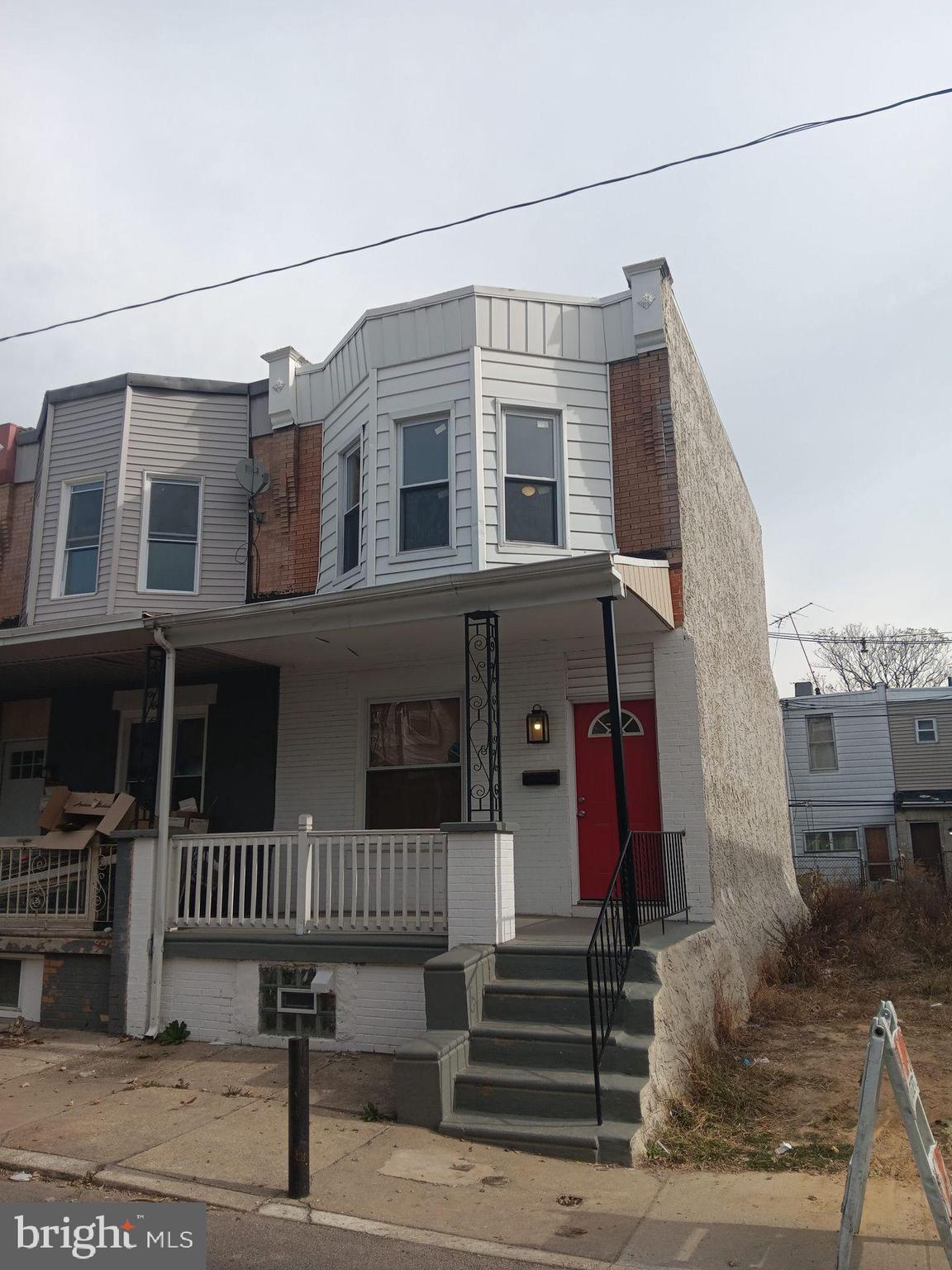 a view of a house with a street