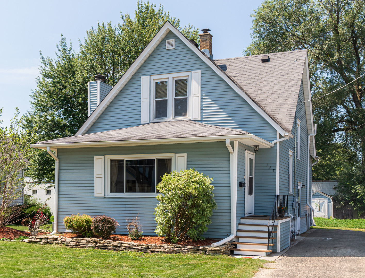 a front view of house with yard