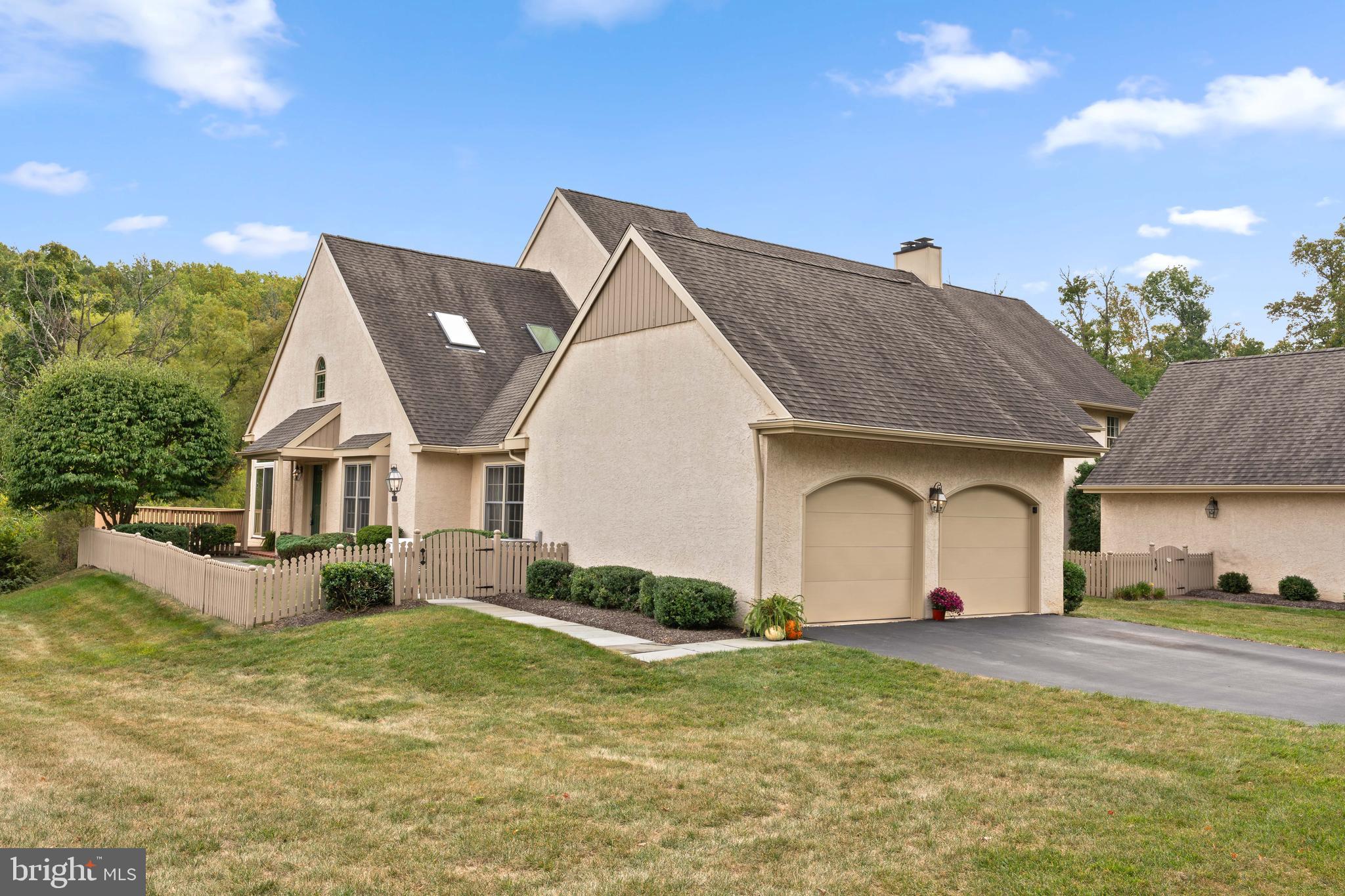 a house view with a garden space