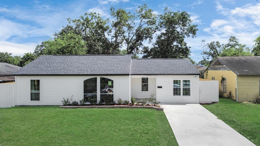 front view of a house with a yard