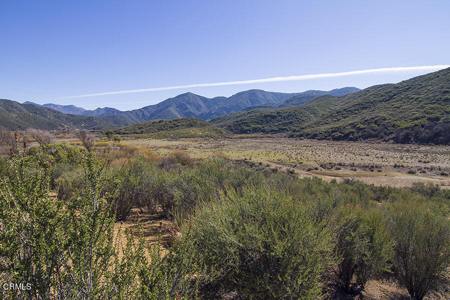 a view of lake with mountain