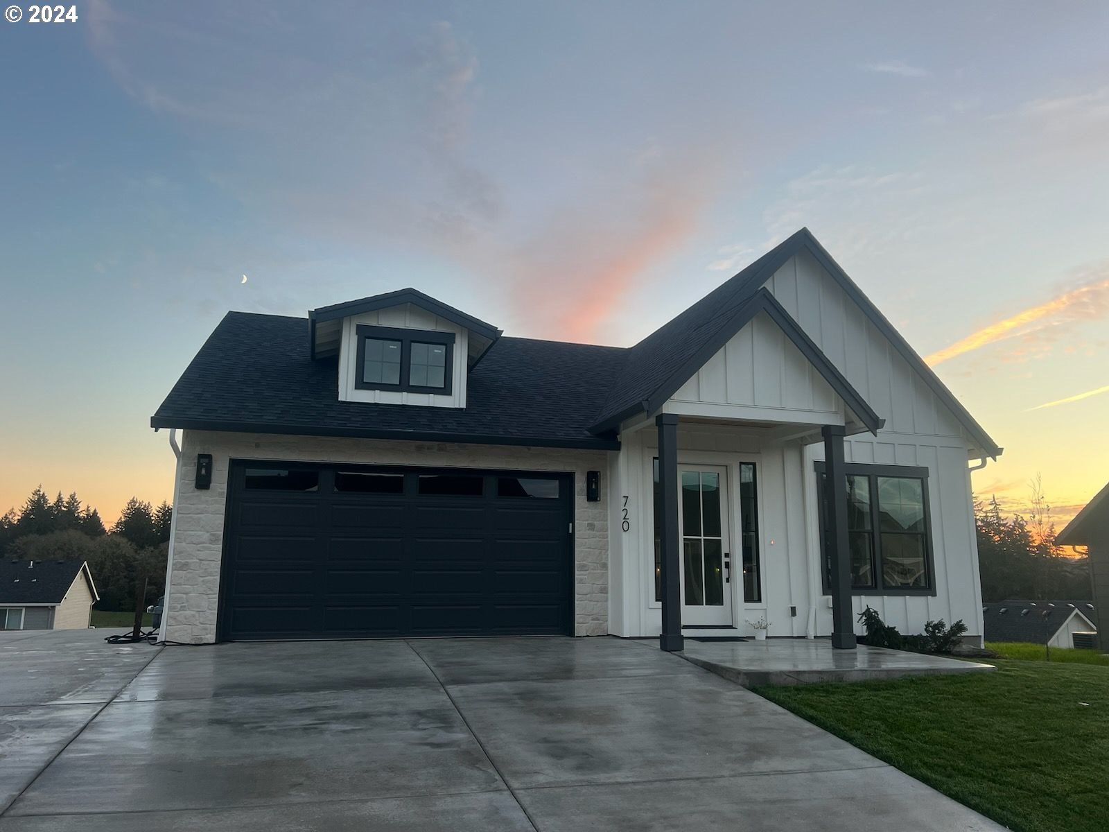 a front view of a house with yard