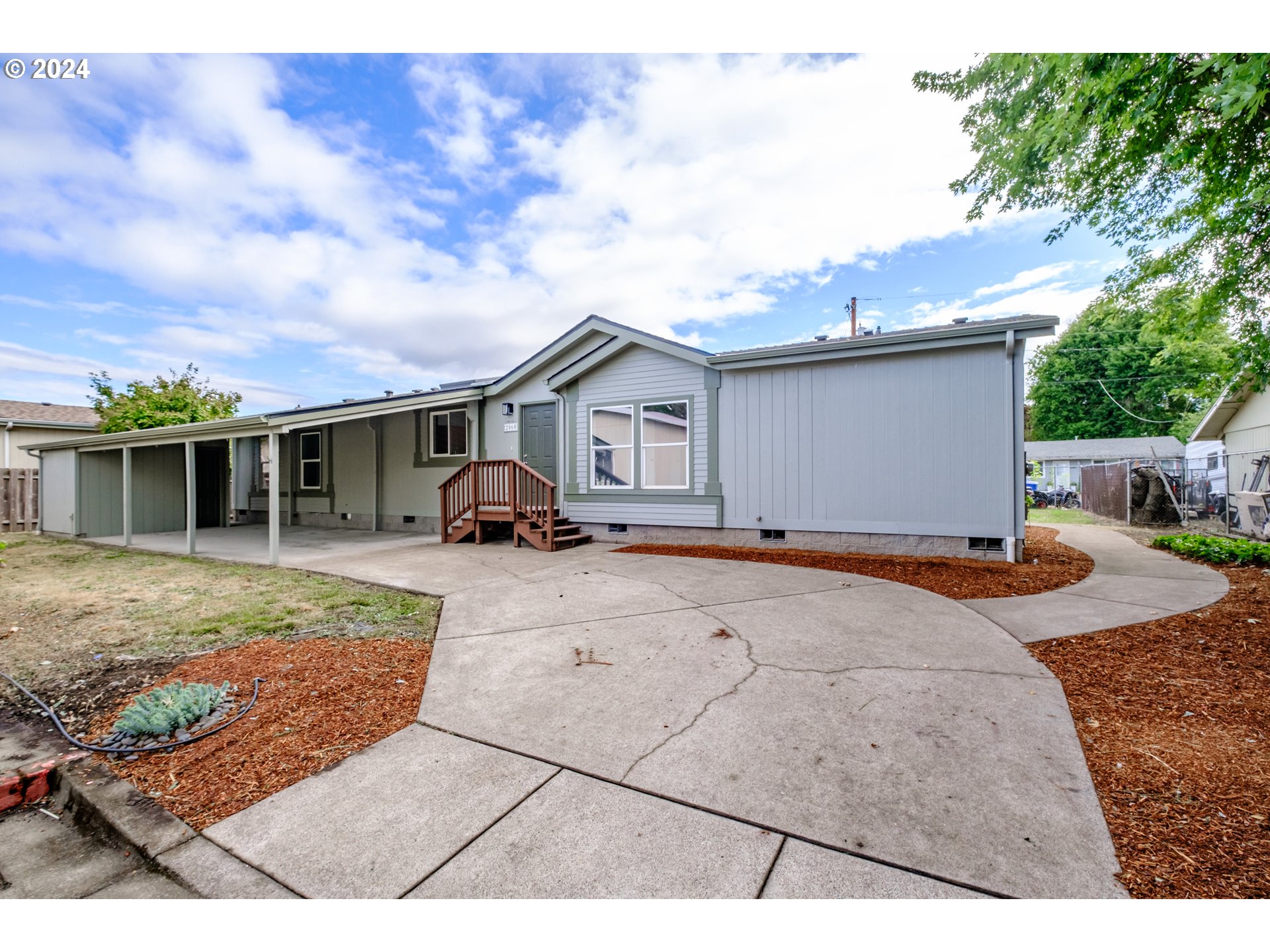 a view of house and outdoor space with yard