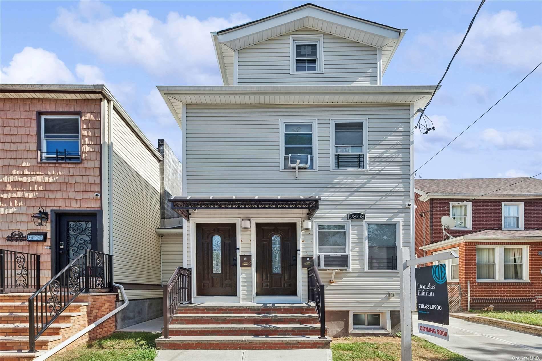 a front view of a house with a yard