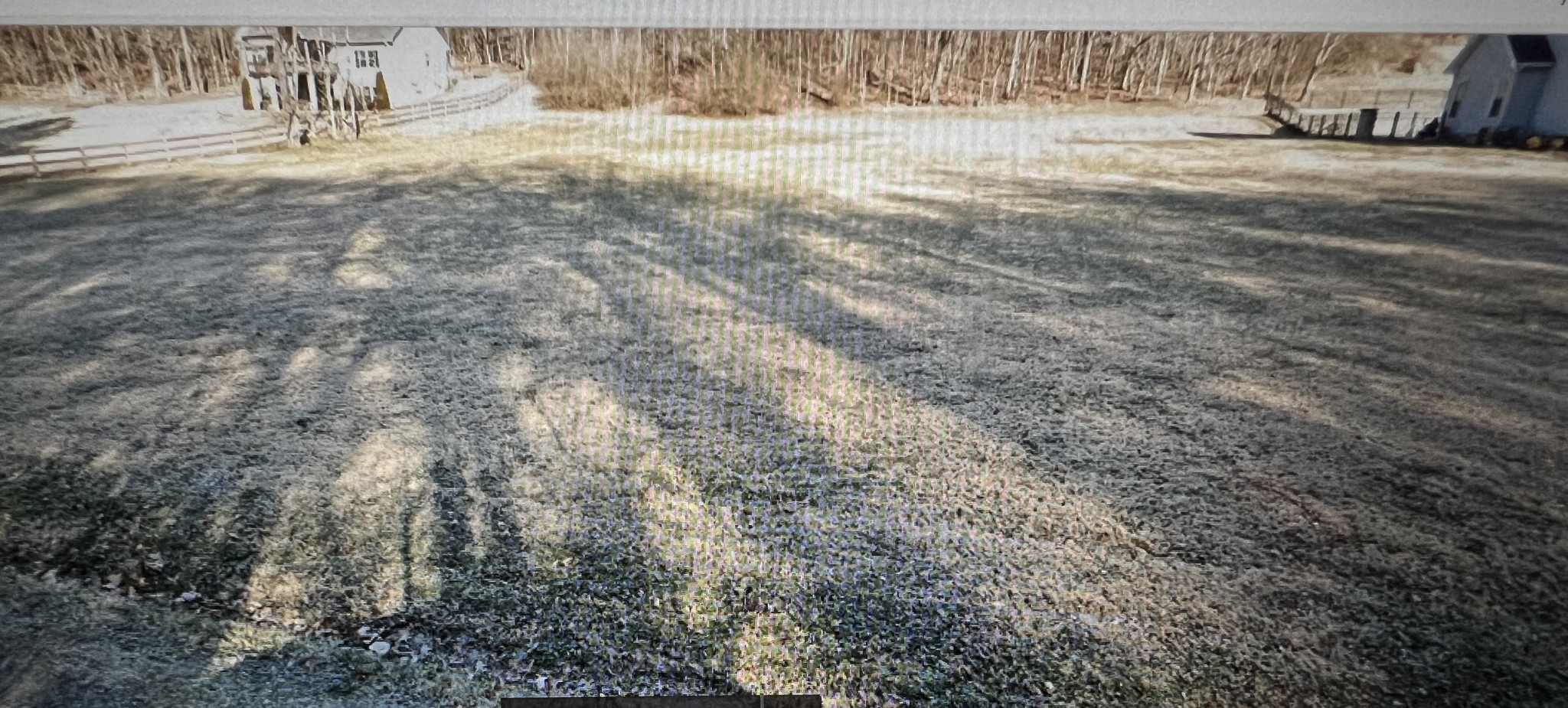 a view of a yard with an outdoor space