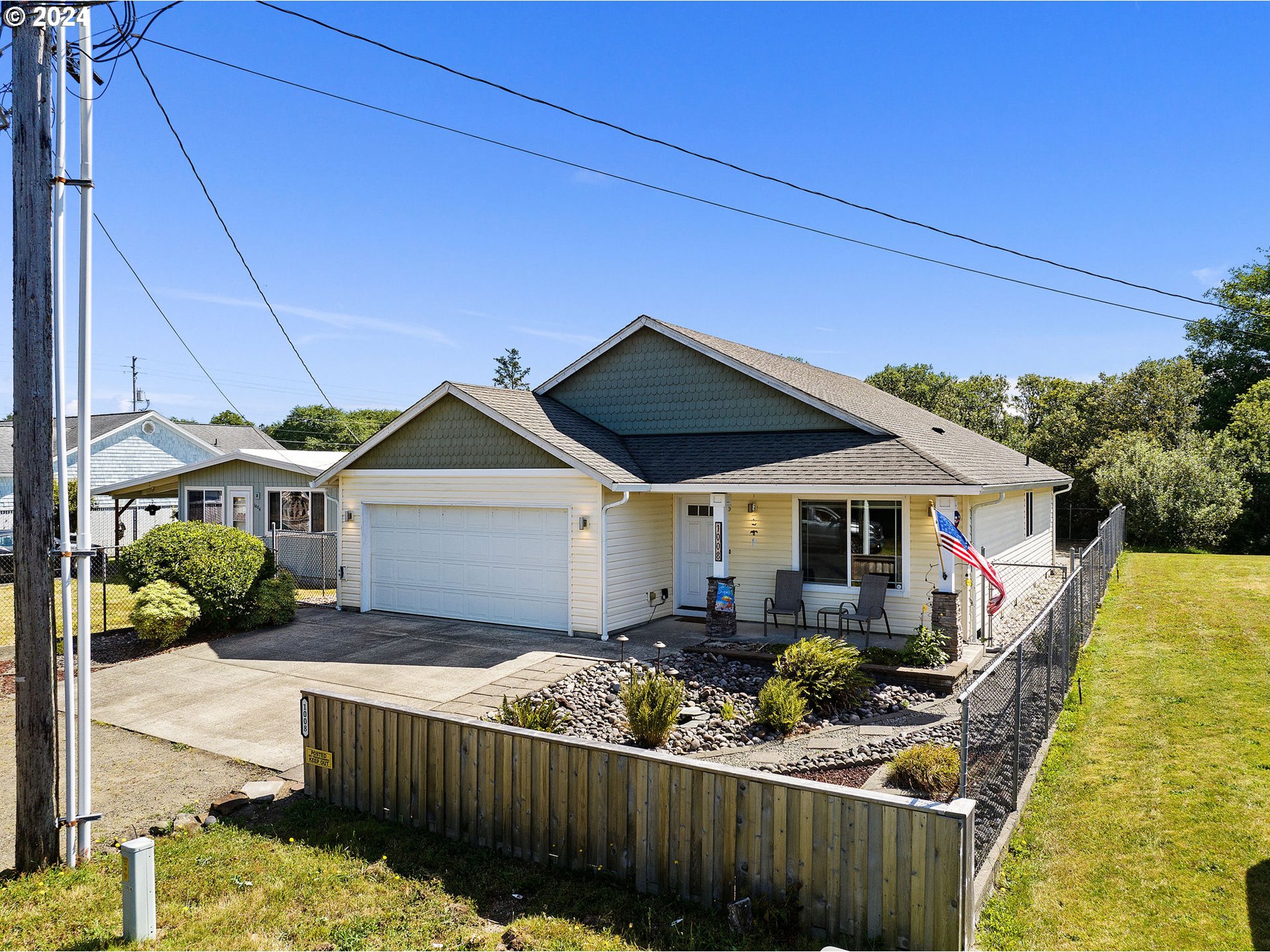 a front view of house with yard and seating area