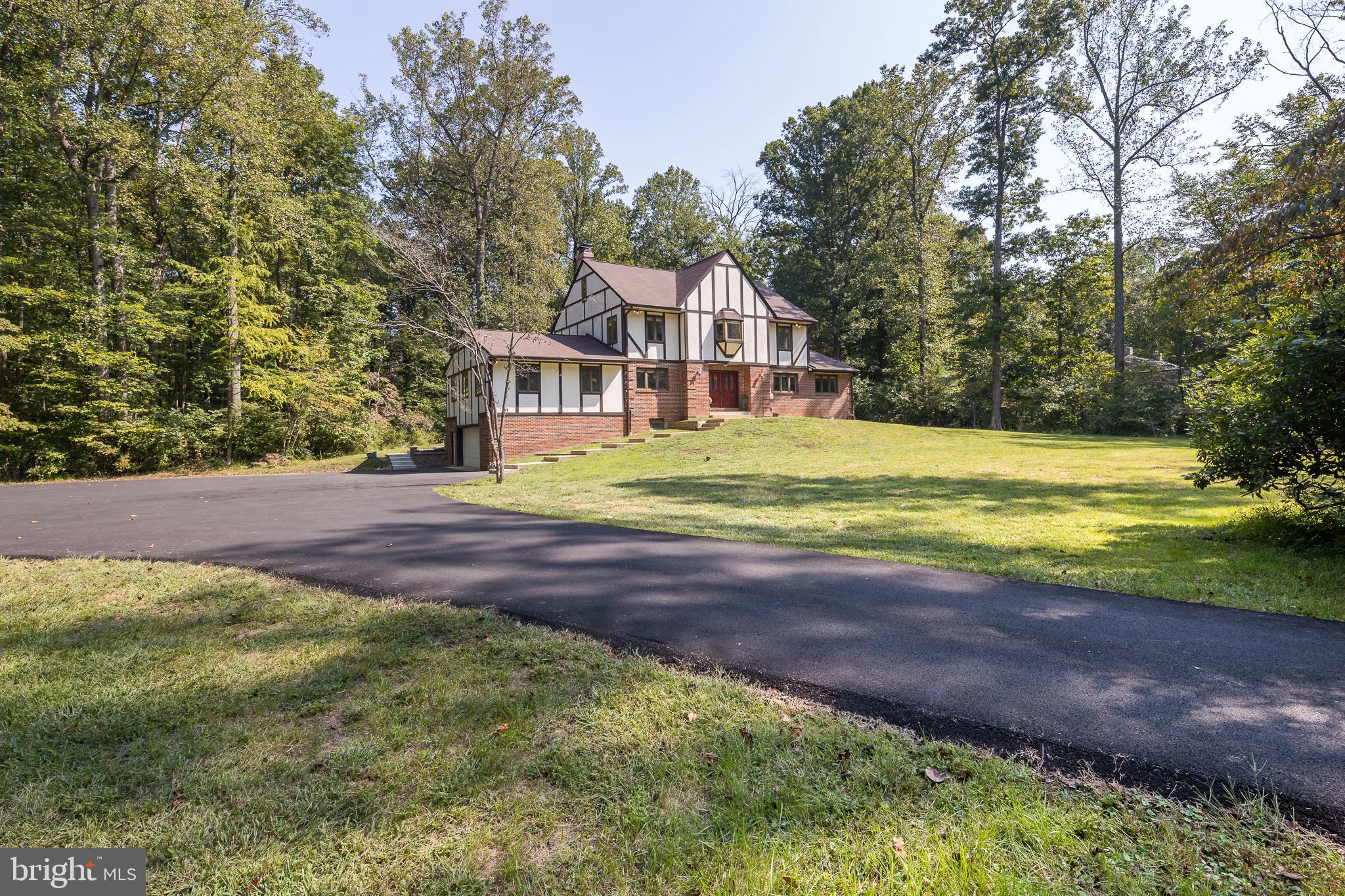 a view of a house with a big yard