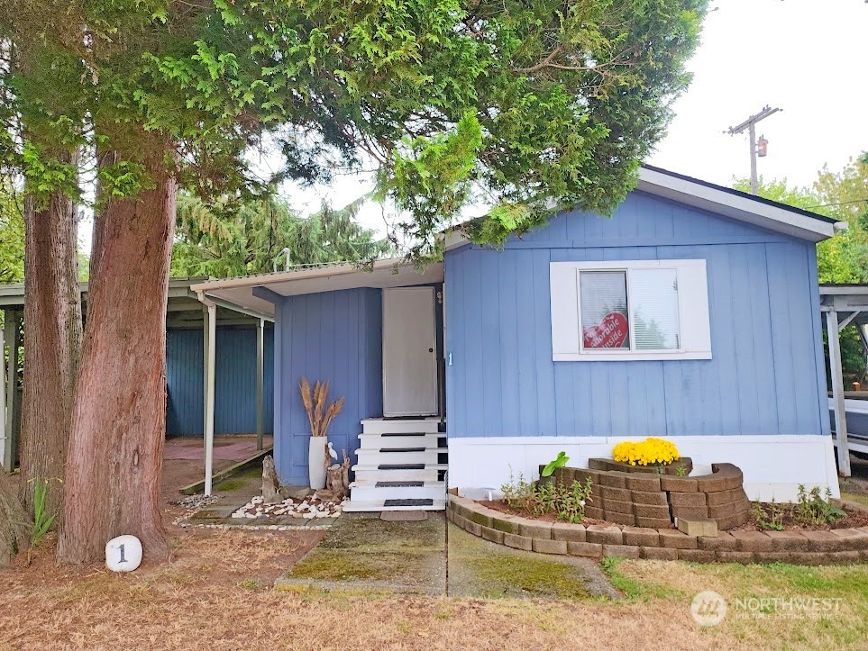 a view of house with outdoor space