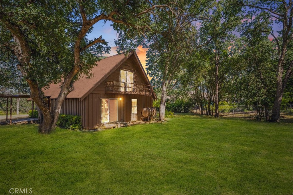 a view of a house with a big yard